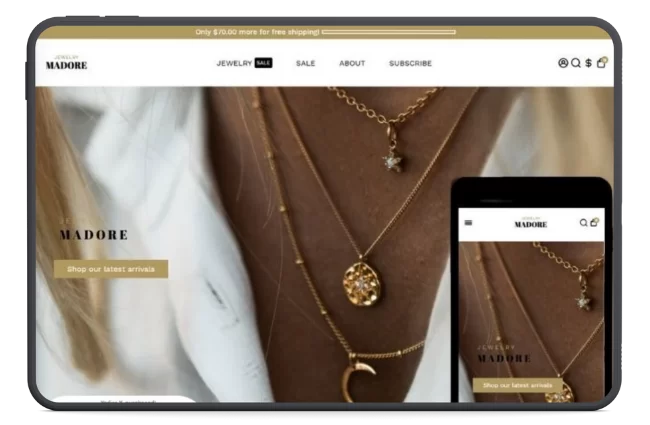 Booster Shopify theme demo displaying layered gold necklaces on a woman's chest, optimized for jewelry ecommerce and online store conversion. Perfect for small ecommerce shops.